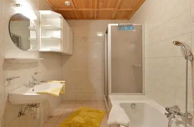 Ein Badezimmer in der Unterkunft Stegerbauer