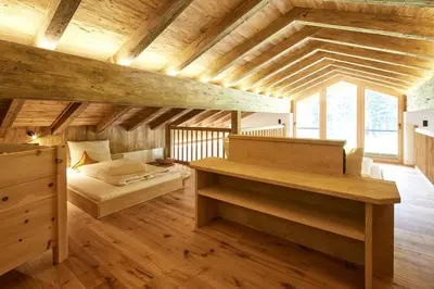 Ein Bett oder Betten in einem Zimmer der Unterkunft Almchalet Weberhof