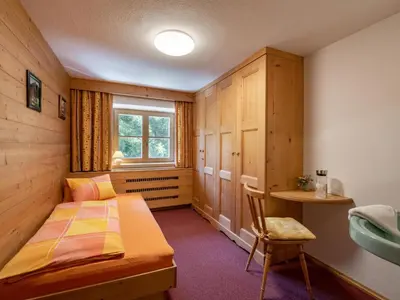 Ein Bett oder Betten in einem Zimmer der Unterkunft Bauernhof Niederfilzboden