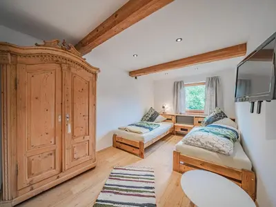 Ein Bett oder Betten in einem Zimmer der Unterkunft Hohe Salve L