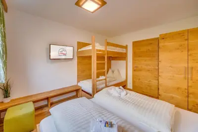 Ein Bett oder Betten in einem Zimmer der Unterkunft Ottilia Top 5 - inklusive Nationalpark SommerCard