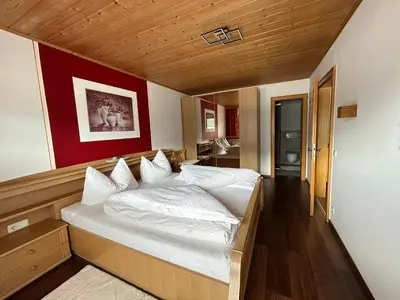 Ein Bett oder Betten in einem Zimmer der Unterkunft Appartement Bergblick