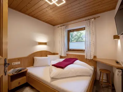 Ein Bett oder Betten in einem Zimmer der Unterkunft Appartement Bergblick