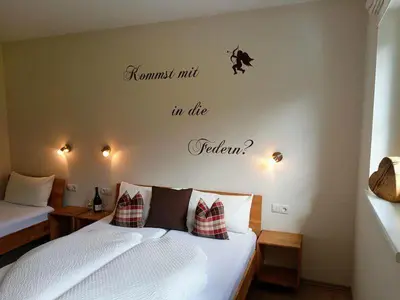 Ein Bett oder Betten in einem Zimmer der Unterkunft Landhaus Sporer