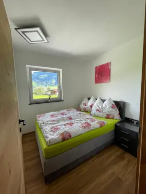 Ein Bett oder Betten in einem Zimmer der Unterkunft Apart Egger