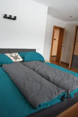 Ein Bett oder Betten in einem Zimmer der Unterkunft Apart Egger