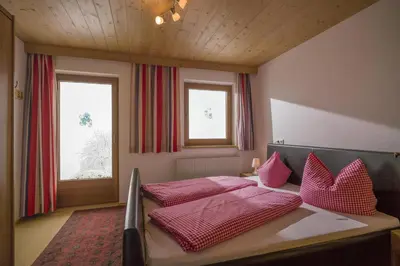 Ein Bett oder Betten in einem Zimmer der Unterkunft Ferienwohnung Unterperler