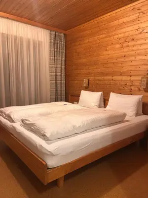 Ein Bett oder Betten in einem Zimmer der Unterkunft Bamerhof
