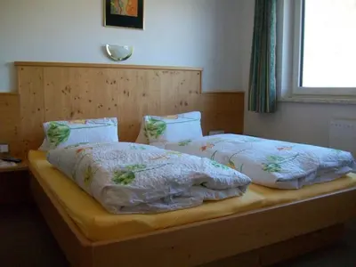 Ein Bett oder Betten in einem Zimmer der Unterkunft Appartements Renate
