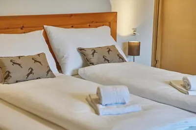 Ein Bett oder Betten in einem Zimmer der Unterkunft Appartement Mountain & Fun