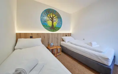 Ein Bett oder Betten in einem Zimmer der Unterkunft Appartement Mountain & Fun