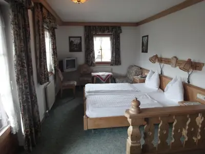 Ein Bett oder Betten in einem Zimmer der Unterkunft Kaiserhotel Neuwirt