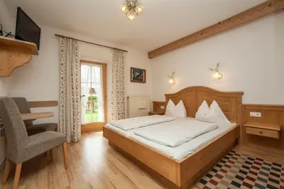 Ein Bett oder Betten in einem Zimmer der Unterkunft Kaiserpension Müllnerhof