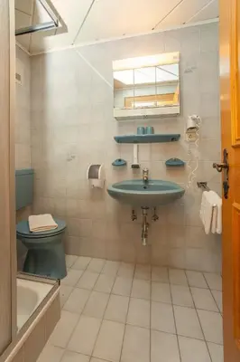 Ein Badezimmer in der Unterkunft Kaiserappartements Müllnerhof