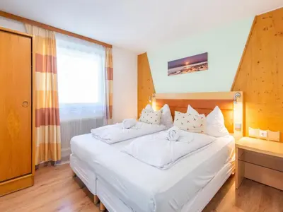Ein Bett oder Betten in einem Zimmer der Unterkunft Chalet in Oberau near Ski Slopes