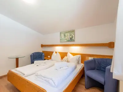 Ein Bett oder Betten in einem Zimmer der Unterkunft Chalet in Oberau near Ski Slopes