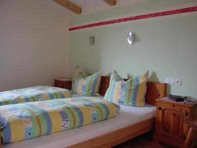 Ein Bett oder Betten in einem Zimmer der Unterkunft Apart Huditz