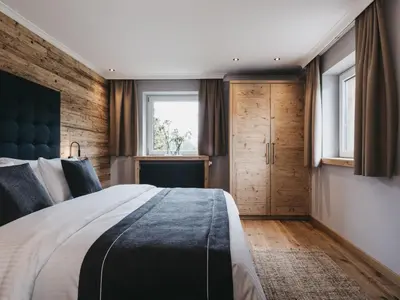 Ein Bett oder Betten in einem Zimmer der Unterkunft VAYA Post Saalbach