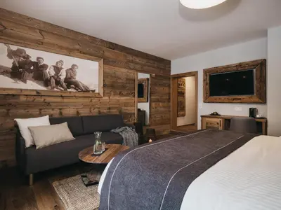 Ein Bett oder Betten in einem Zimmer der Unterkunft VAYA Post Saalbach