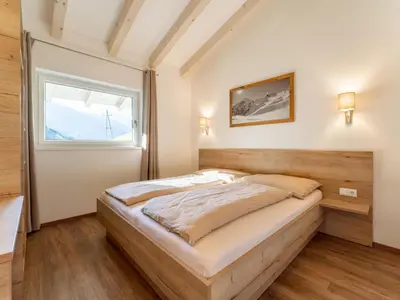 Ein Bett oder Betten in einem Zimmer der Unterkunft Apartment Eder 302