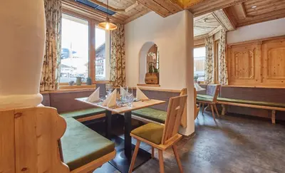 Ein Sitzbereich in der Unterkunft Hotel Hubertushof