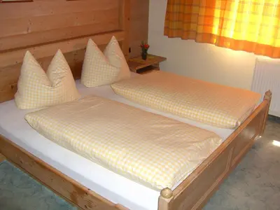 Ein Bett oder Betten in einem Zimmer der Unterkunft Haus Christl