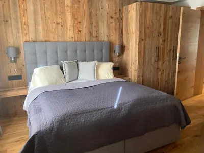 Ein Bett oder Betten in einem Zimmer der Unterkunft Lodge14