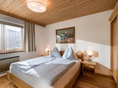 Ein Bett oder Betten in einem Zimmer der Unterkunft Haus Dorfblick