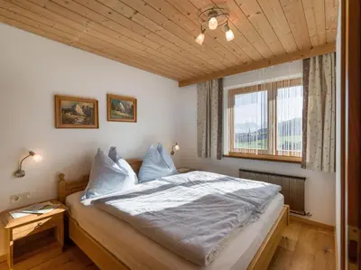 Ein Bett oder Betten in einem Zimmer der Unterkunft Haus Dorfblick