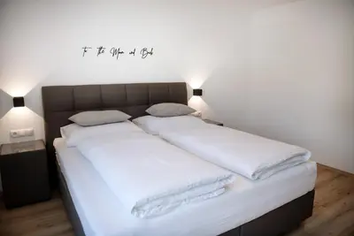 Ein Bett oder Betten in einem Zimmer der Unterkunft AUSZEIT Apartments