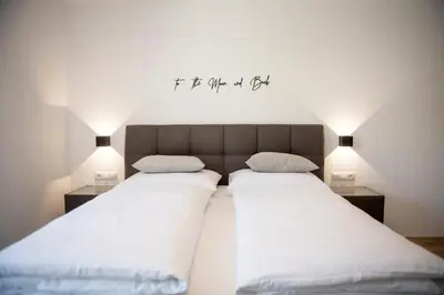 Ein Bett oder Betten in einem Zimmer der Unterkunft AUSZEIT Apartments
