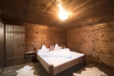 Ein Bett oder Betten in einem Zimmer der Unterkunft Hütte - Ferienhaus Bischoferhütte für 2-10 Personen