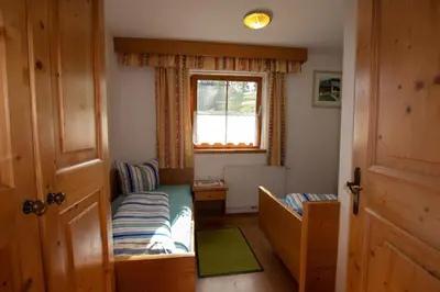 Ein Bett oder Betten in einem Zimmer der Unterkunft Ferienwohnung zum Mühltal
