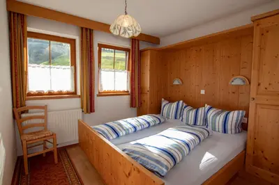 Ein Bett oder Betten in einem Zimmer der Unterkunft Ferienwohnung zum Mühltal