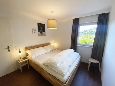 Ein Bett oder Betten in einem Zimmer der Unterkunft Wohnung Steixner