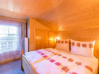Ein Bett oder Betten in einem Zimmer der Unterkunft Chalet in Hochfilzen by Ski Piste