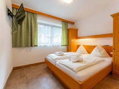 Ein Bett oder Betten in einem Zimmer der Unterkunft Löhnersbach