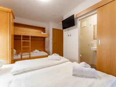 Ein Bett oder Betten in einem Zimmer der Unterkunft Löhnersbach