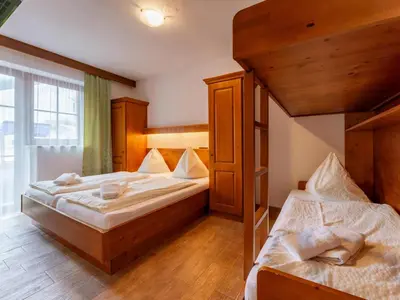 Ein Bett oder Betten in einem Zimmer der Unterkunft Chalet Vorderjausern