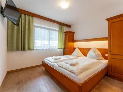 Ein Bett oder Betten in einem Zimmer der Unterkunft Chalet Vorderjausern
