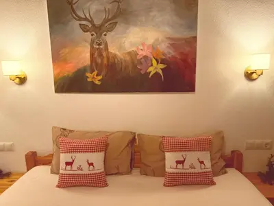 Ein Bett oder Betten in einem Zimmer der Unterkunft Ferienhaus Zillertal Panorama Blick Balkon Sauna