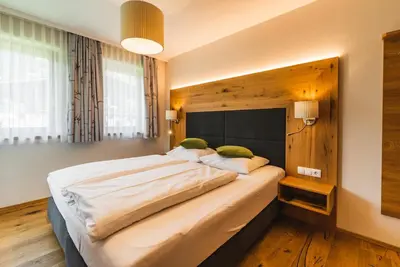Ein Bett oder Betten in einem Zimmer der Unterkunft Haus Sabrina - Ferienwohnungen