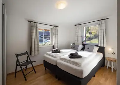 Ein Bett oder Betten in einem Zimmer der Unterkunft Ferienhaus Wirtheim