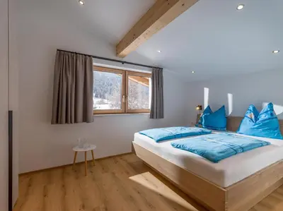 Ein Bett oder Betten in einem Zimmer der Unterkunft Haus Seisl