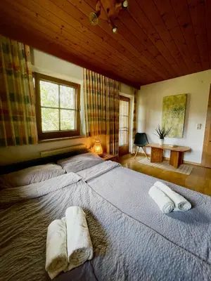 Ein Bett oder Betten in einem Zimmer der Unterkunft Alpine cottage with exceptional view
