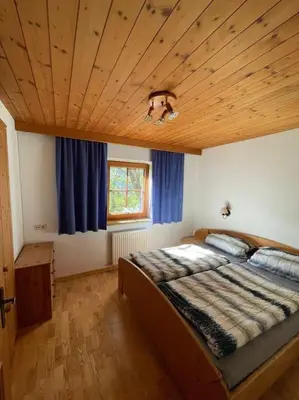 Ein Bett oder Betten in einem Zimmer der Unterkunft Alpine cottage with exceptional view
