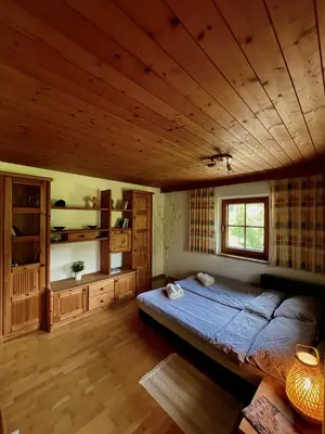 Ein Bett oder Betten in einem Zimmer der Unterkunft Alpine cottage with exceptional view