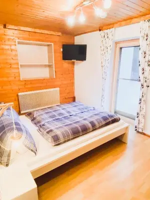 Ein Bett oder Betten in einem Zimmer der Unterkunft Ferienwohnung Steinberger