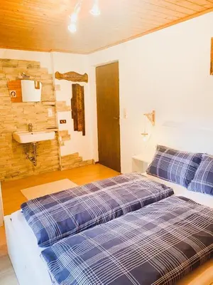 Ein Bett oder Betten in einem Zimmer der Unterkunft Ferienwohnung Steinberger