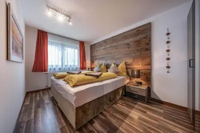 Ein Bett oder Betten in einem Zimmer der Unterkunft Zillerstübchen